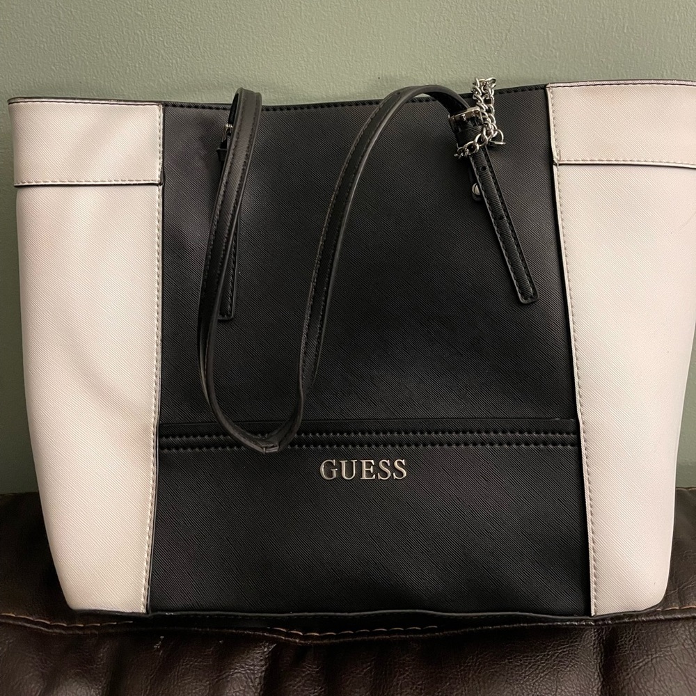 Used black  and white Guess tote bag .
